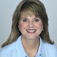 Susan E Mains